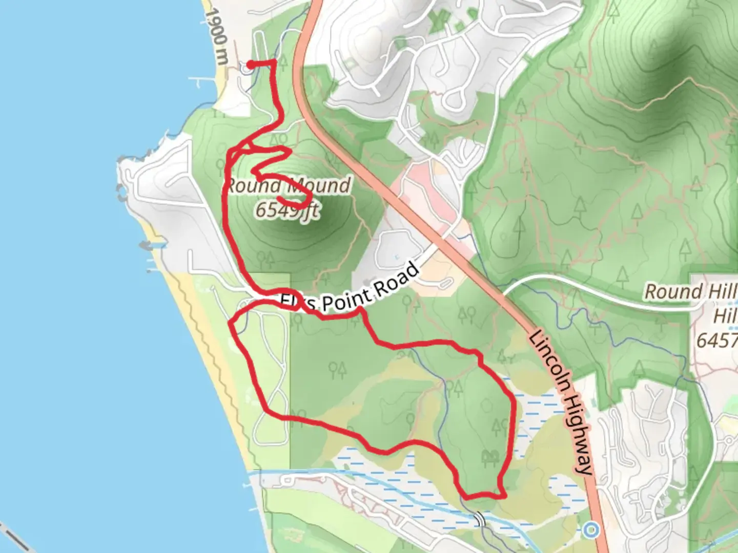 An image depicting the trail Round Mound Loop and its surrounding area.