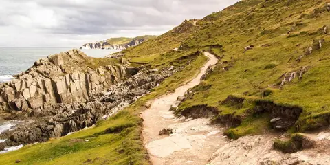 An image depicting the trail Woolacombe to Braunton Walk and its surrounding area.