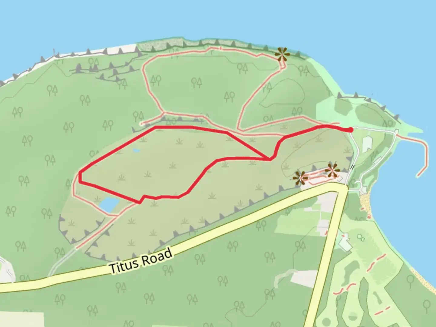 An image depicting the trail Glacial Grooves State Memorial Loop and its surrounding area.