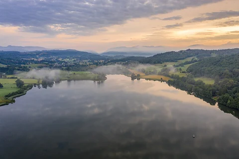 An image depicting the trail Grizedale Forest and Esthwaite Water Loop and its surrounding area.