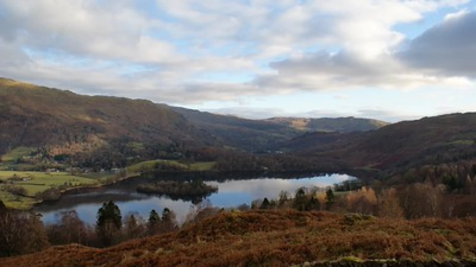 An image depicting the trail Grasmere to Ambleside Walk via Grasmere and its surrounding area.