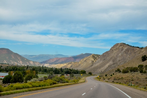 An image depicting the trail Red Canyon Stock Driveway Trail and its surrounding area.