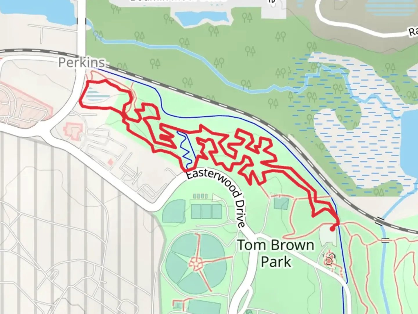 An image depicting the trail Gun Range - Magnolia Loop Trail and its surrounding area.