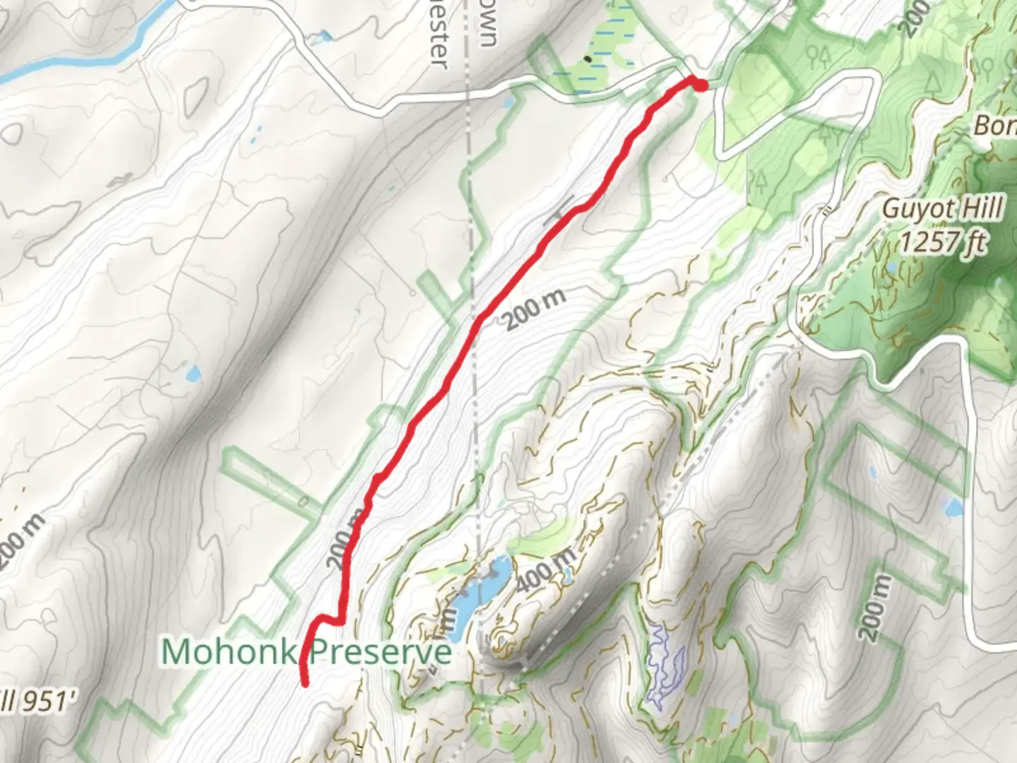 An image depicting the trail Mohonk Lake from Clove Road and its surrounding area.