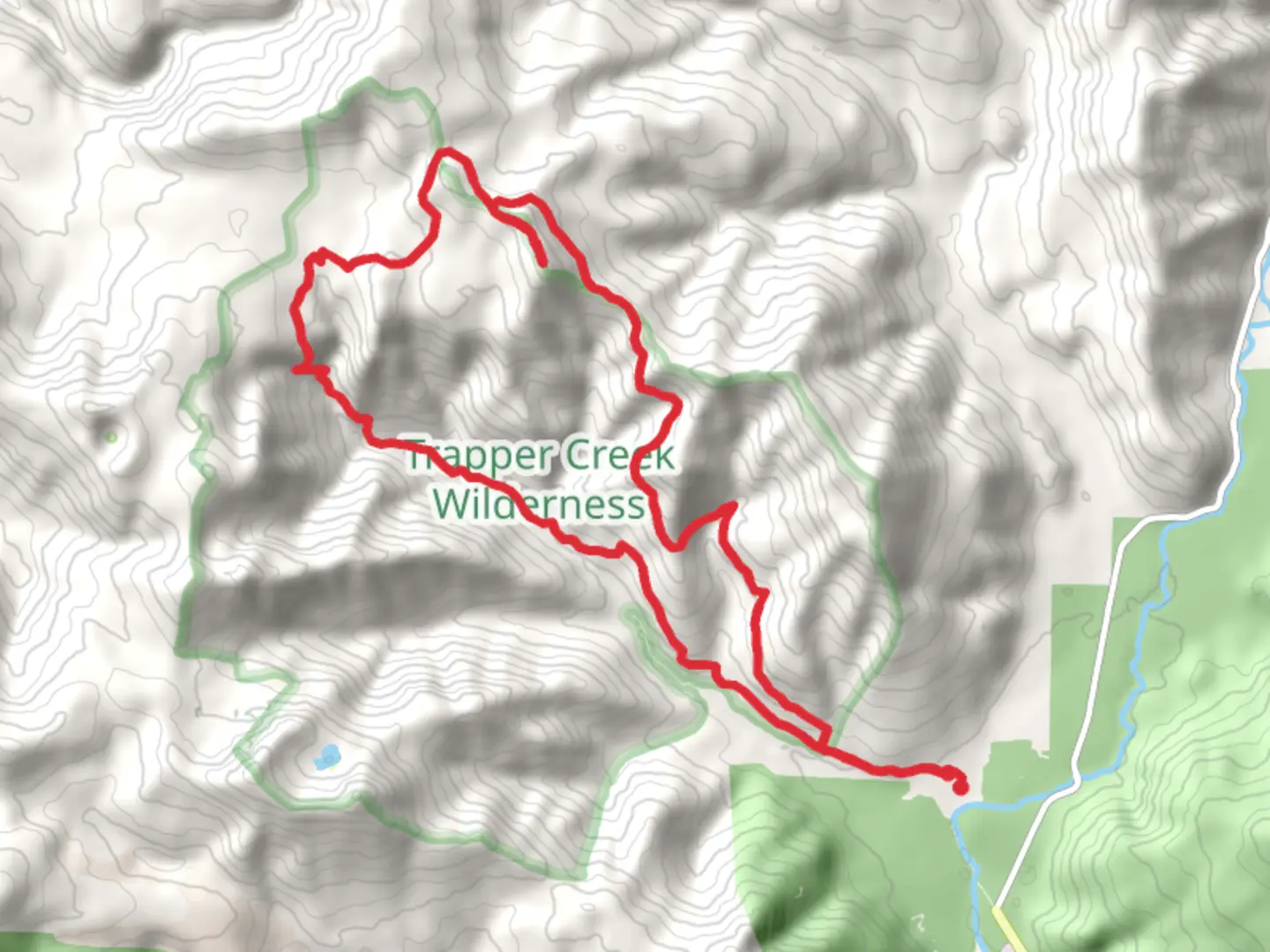 An image depicting the trail Observation Peak Loop via Trapper Creek Trail and its surrounding area.