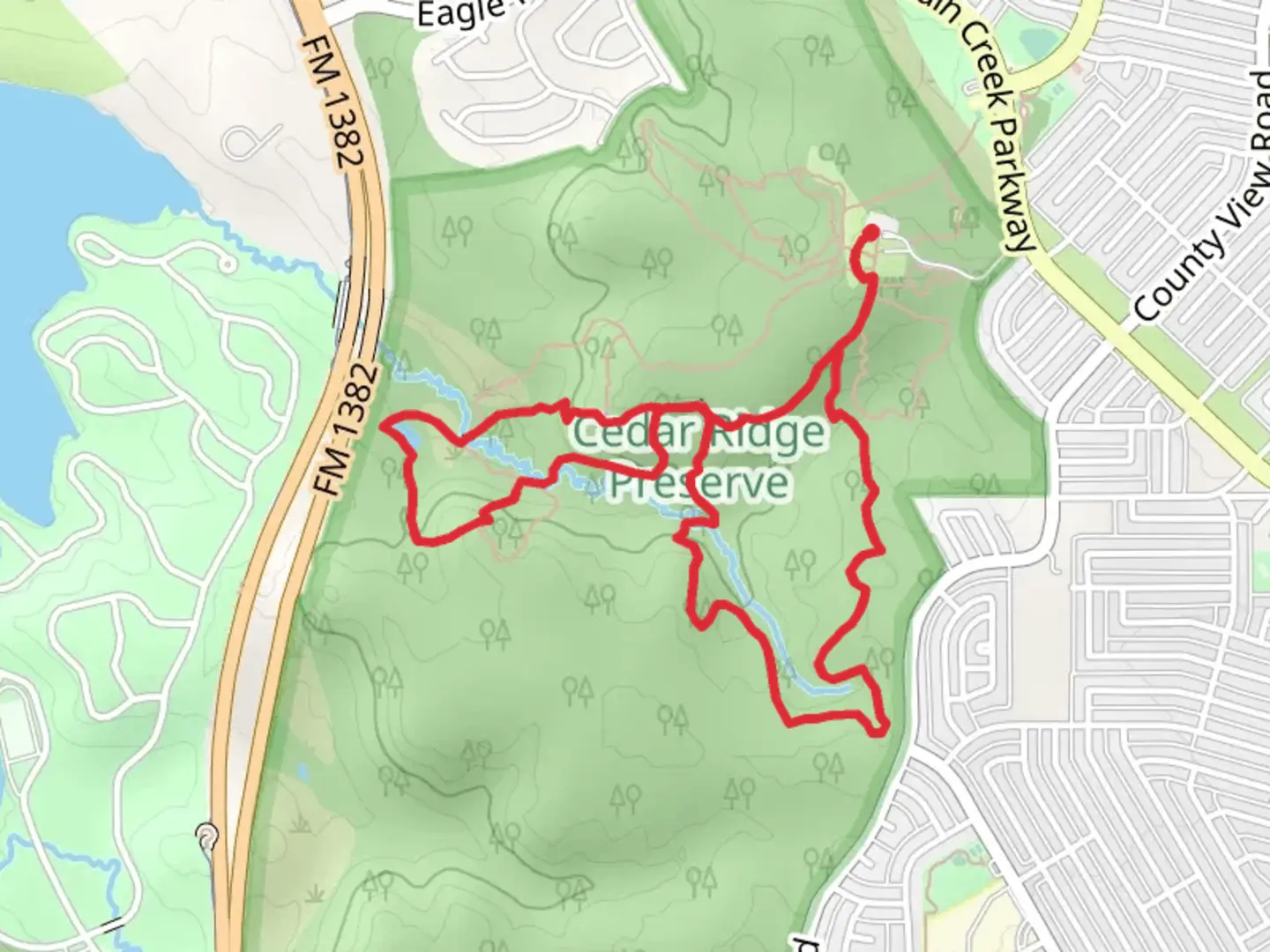 An image depicting the trail Cedar Brake, Fossil Valley and Cattail Pond Loop Trail and its surrounding area.