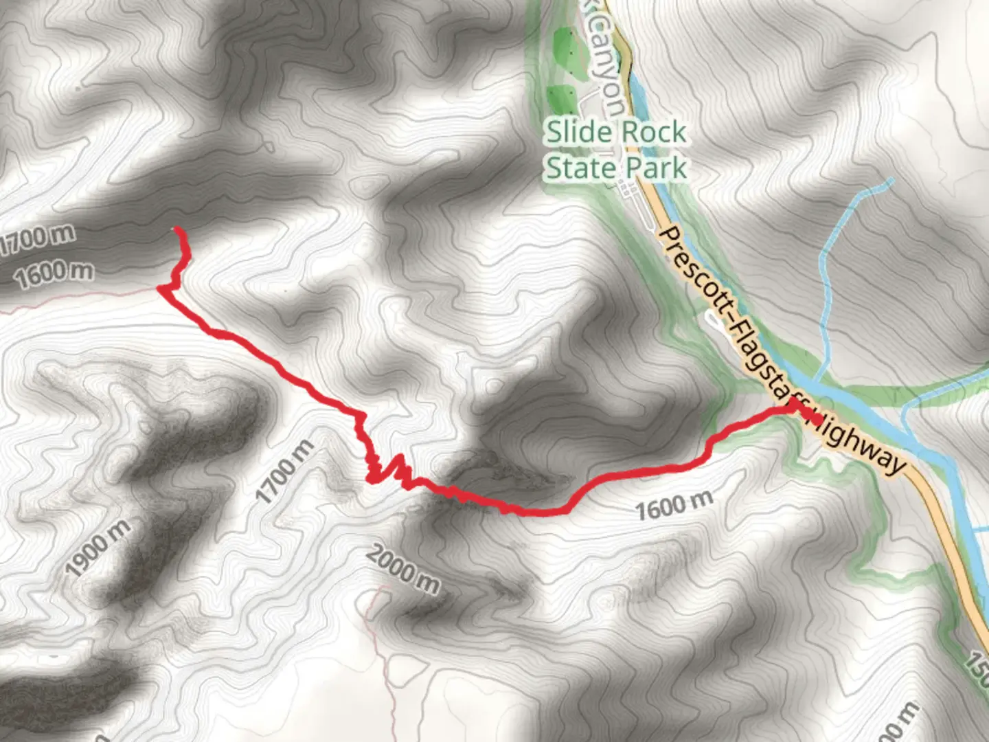 An image depicting the trail Vultee Arch via Sterling Pass Trail and its surrounding area.
