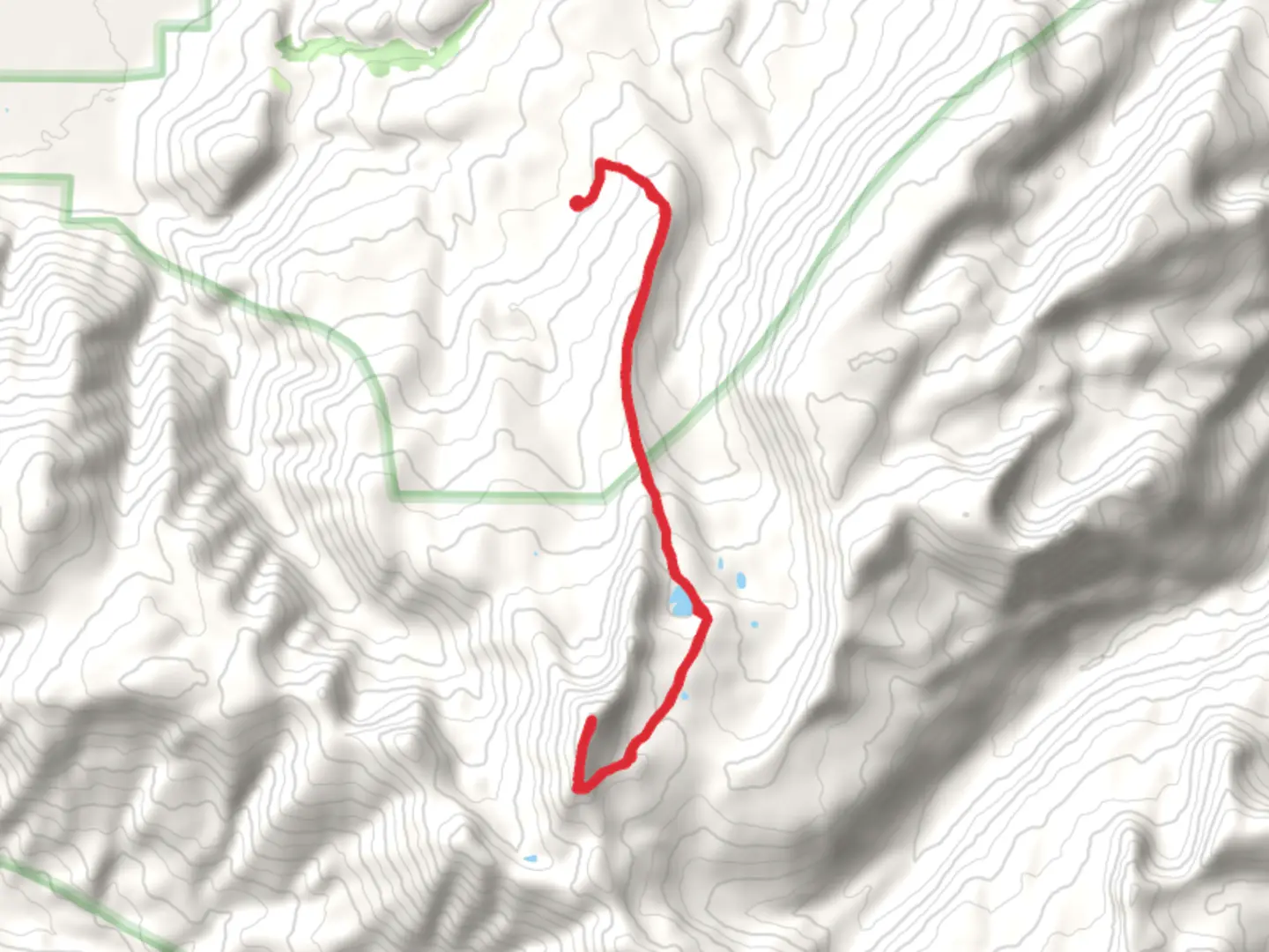 An image depicting the trail Jackson Peak via Goodwin Lake Trail and its surrounding area.