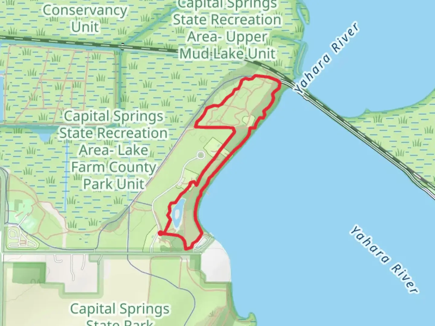 An image depicting the trail Lake Waubesa West Shore Loop Trail and its surrounding area.