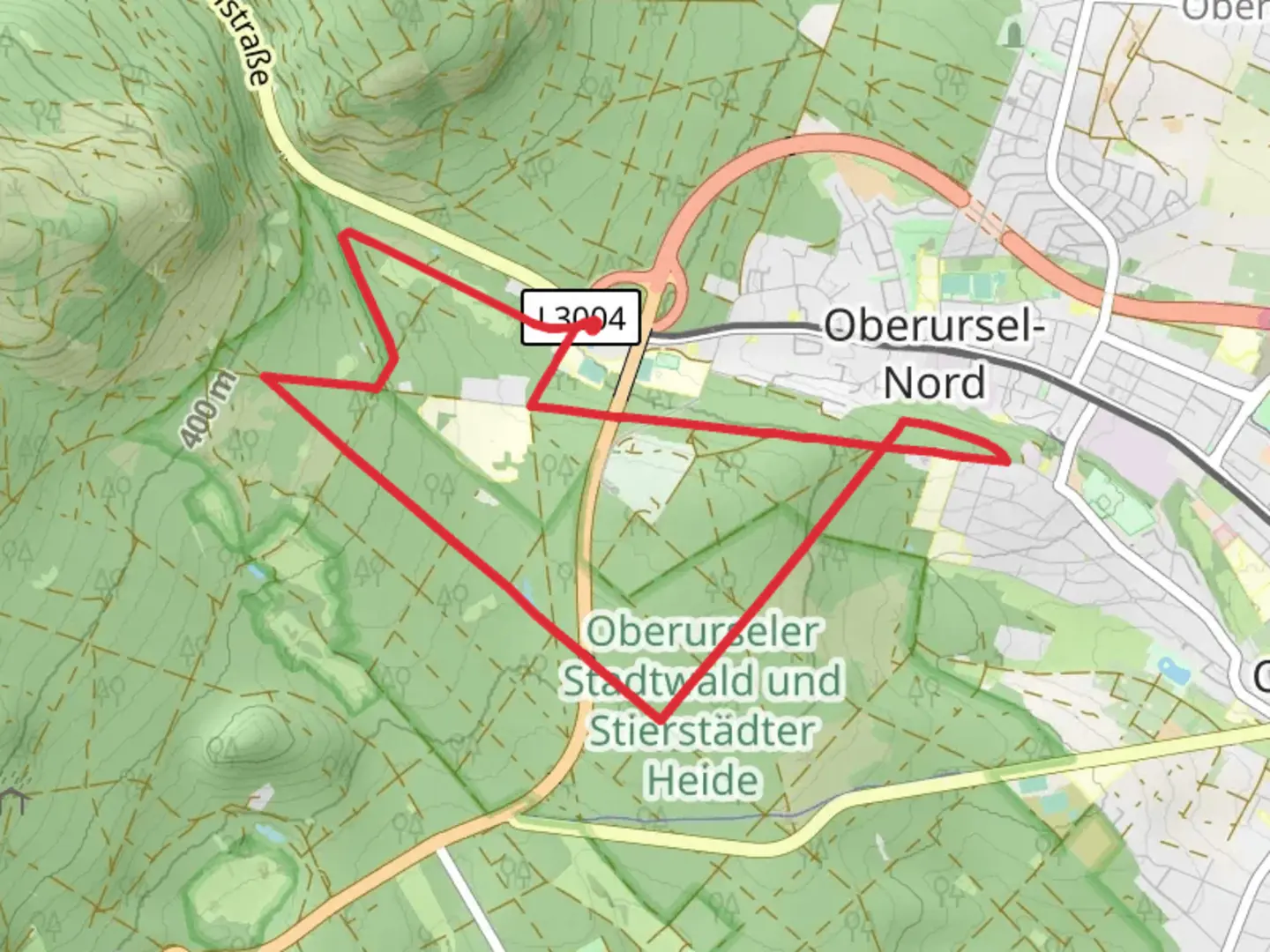 An image depicting the trail Oberurseler Rundwanderweg and Taunusklub Route and its surrounding area.