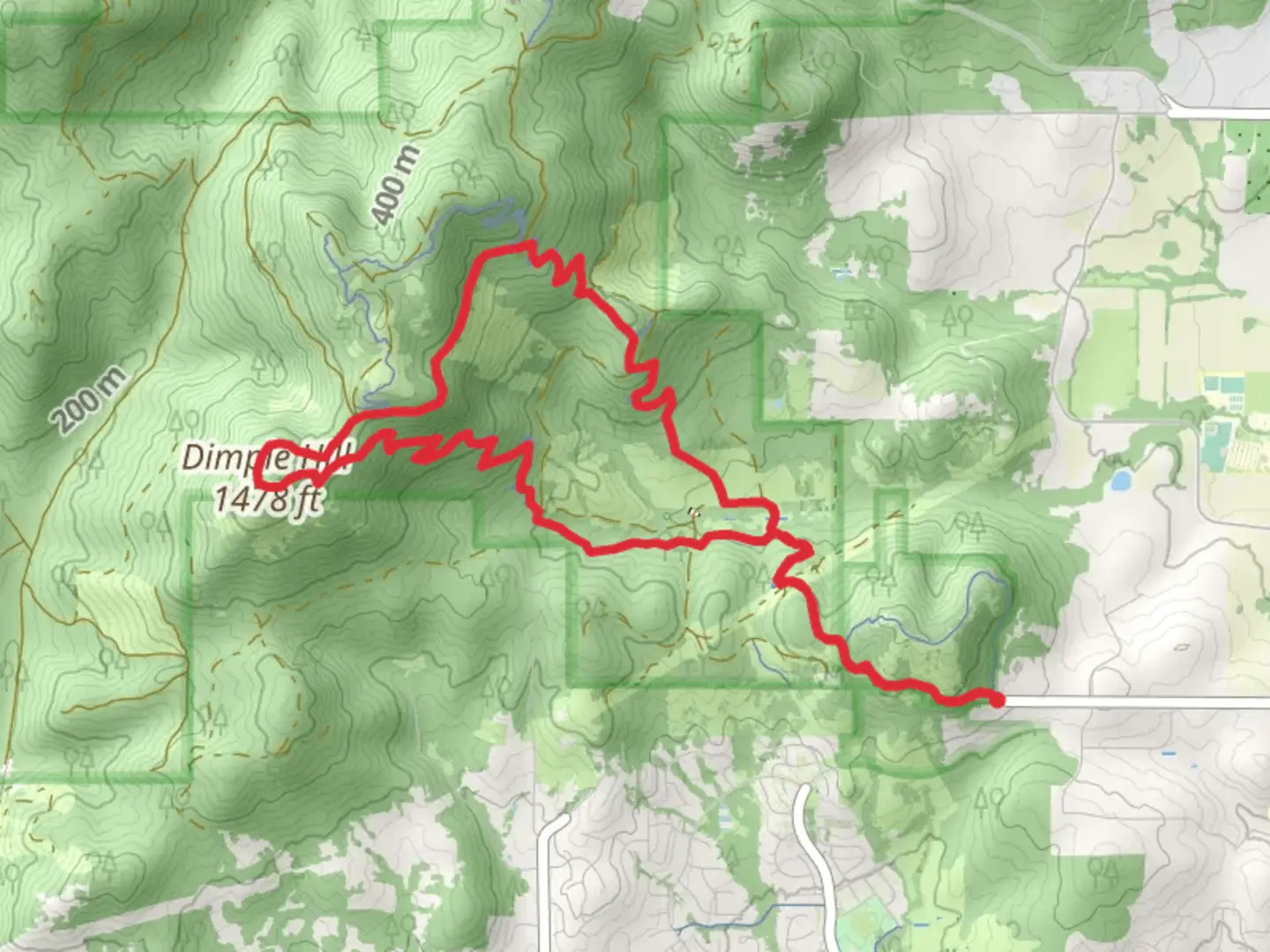 An image depicting the trail Dan' Trail and Dimple Hill Loop and its surrounding area.