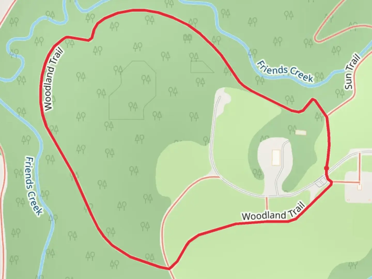 An image depicting the trail Woodland Loop Trail and its surrounding area.