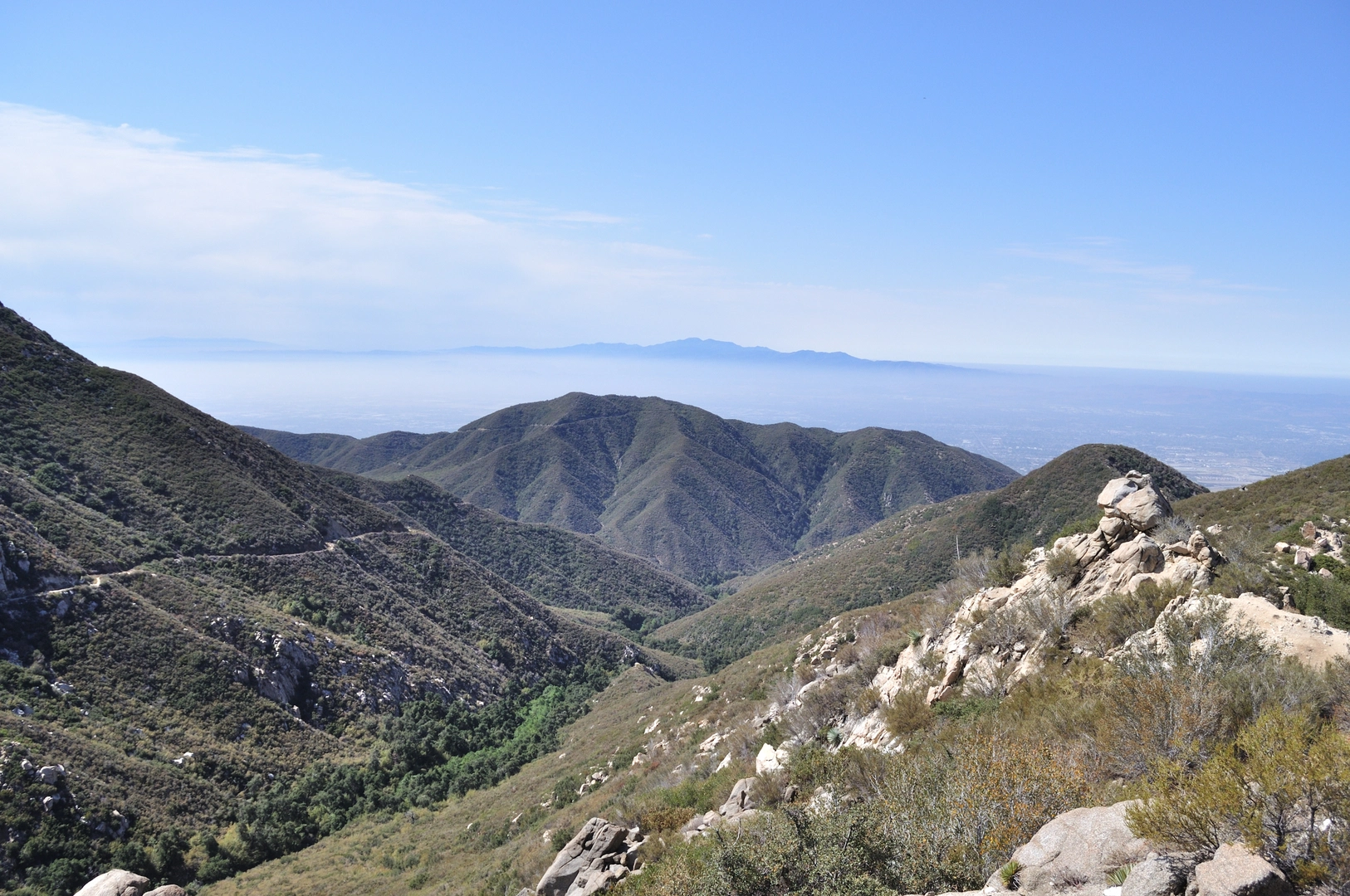 An image depicting the trail Stoddard Peak Hiking Trail and its surrounding area.
