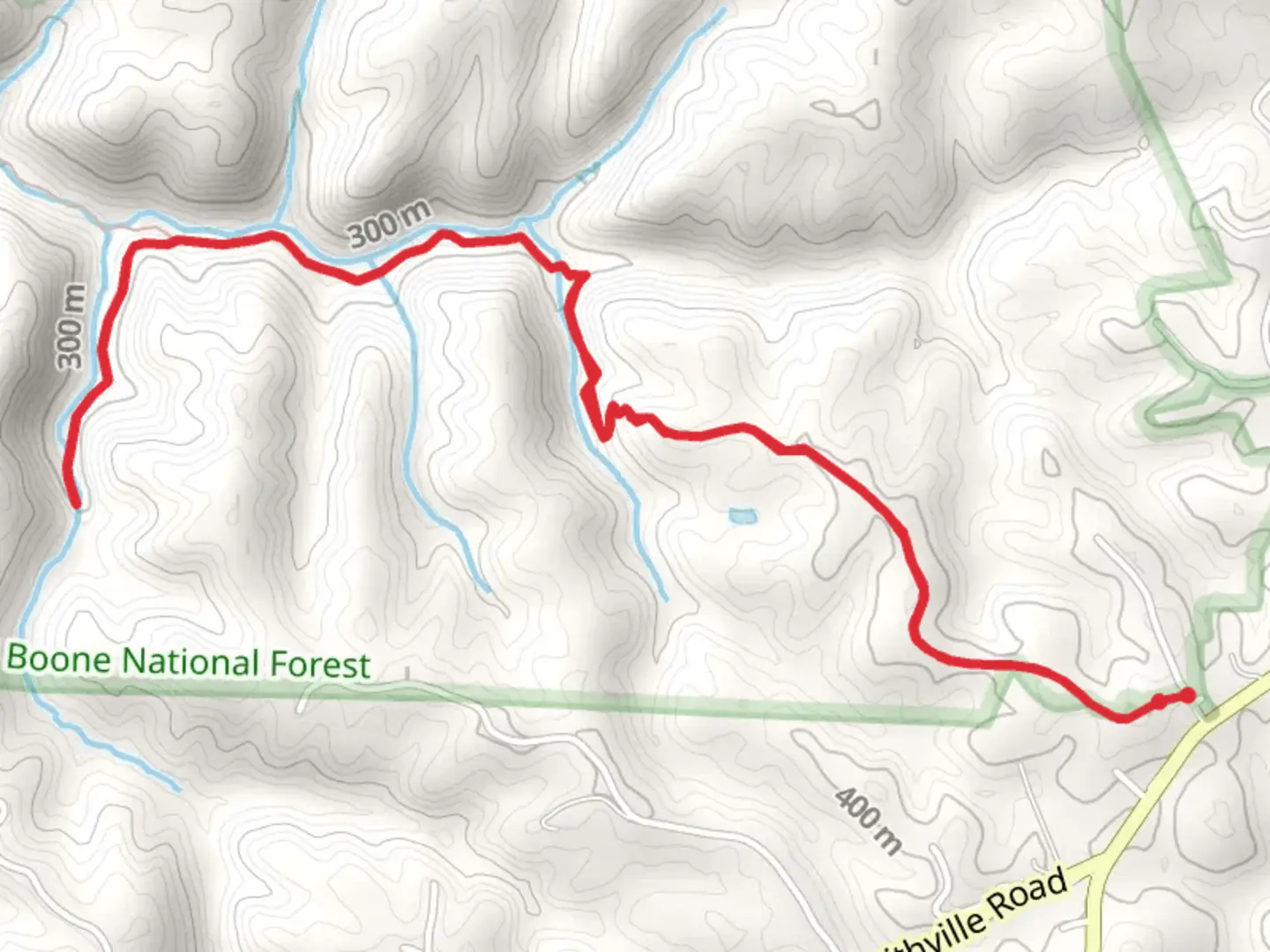 An image depicting the trail Lick Creek Falls Trail and its surrounding area.