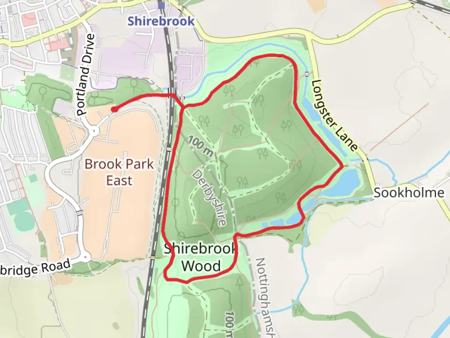 An image depicting the trail Shirebrook Wood Short Loop and its surrounding area.