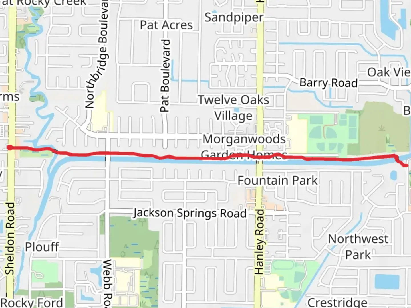 An image depicting the trail Town 'N Country Greenway and its surrounding area.