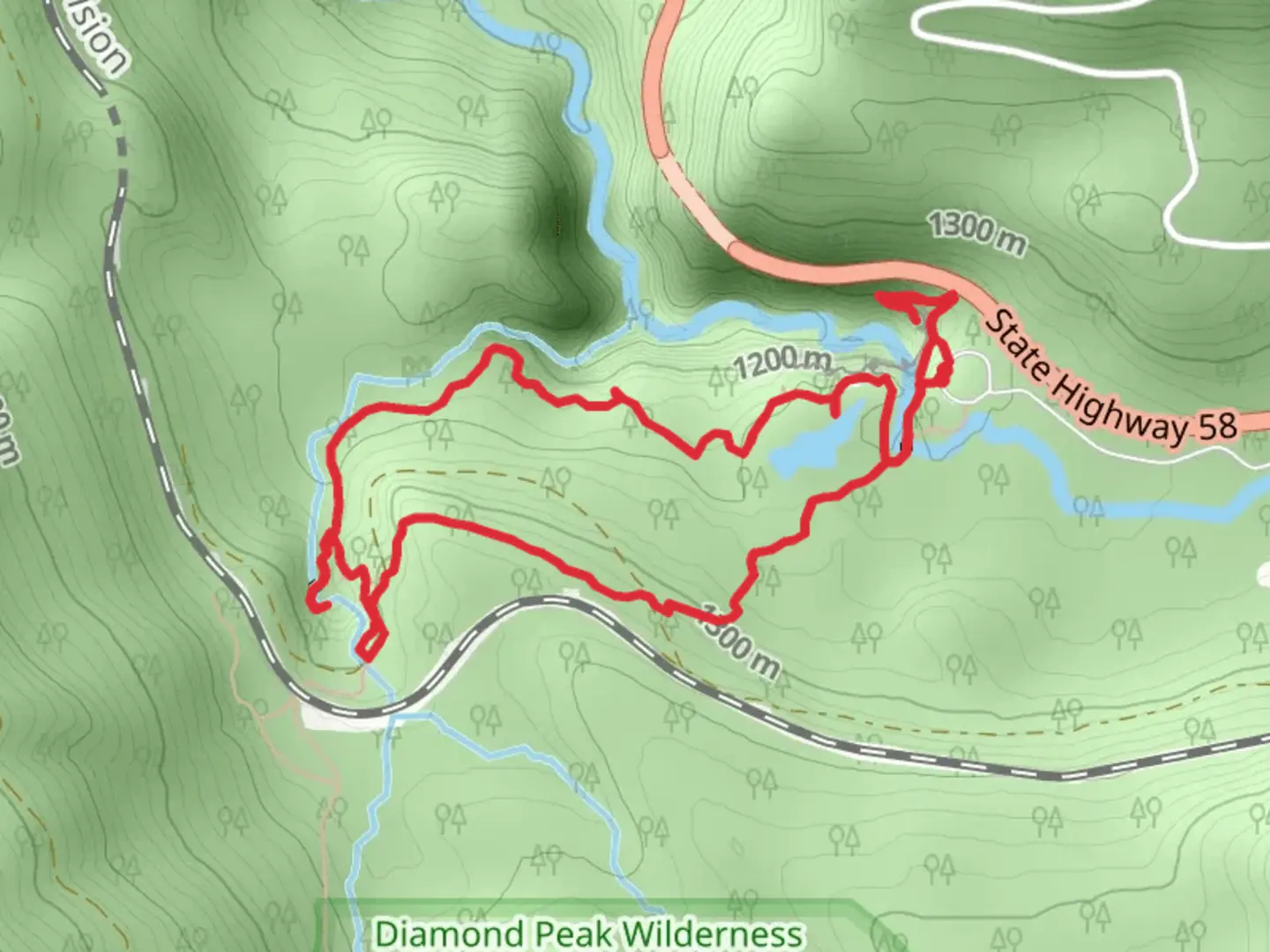 An image depicting the trail Too Much Bear Lake and Diamond Creek Falls Loop Trail and its surrounding area.