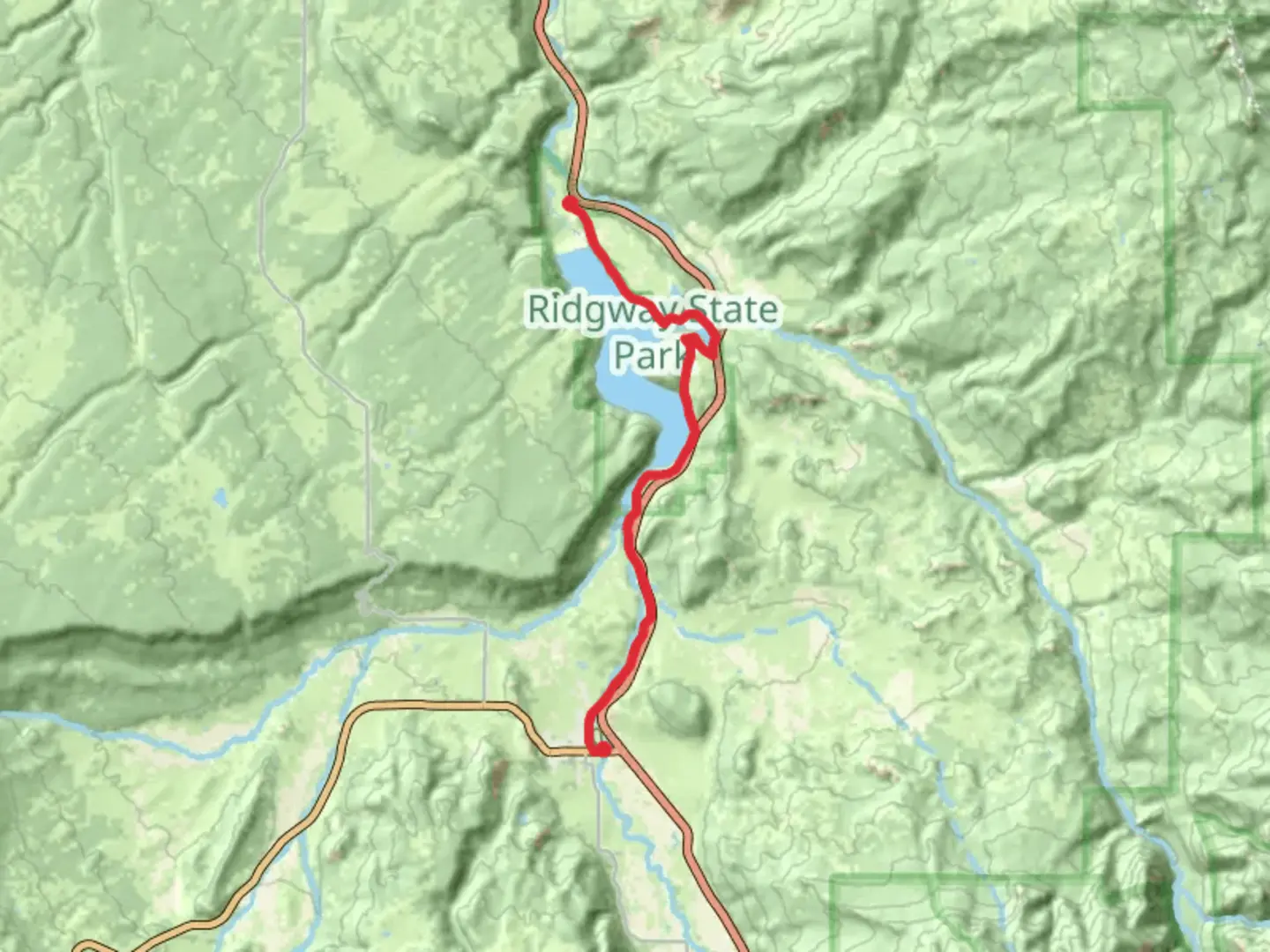 An image depicting the trail Umcompahgre River Walk and Enchanted Mesa Trail and its surrounding area.