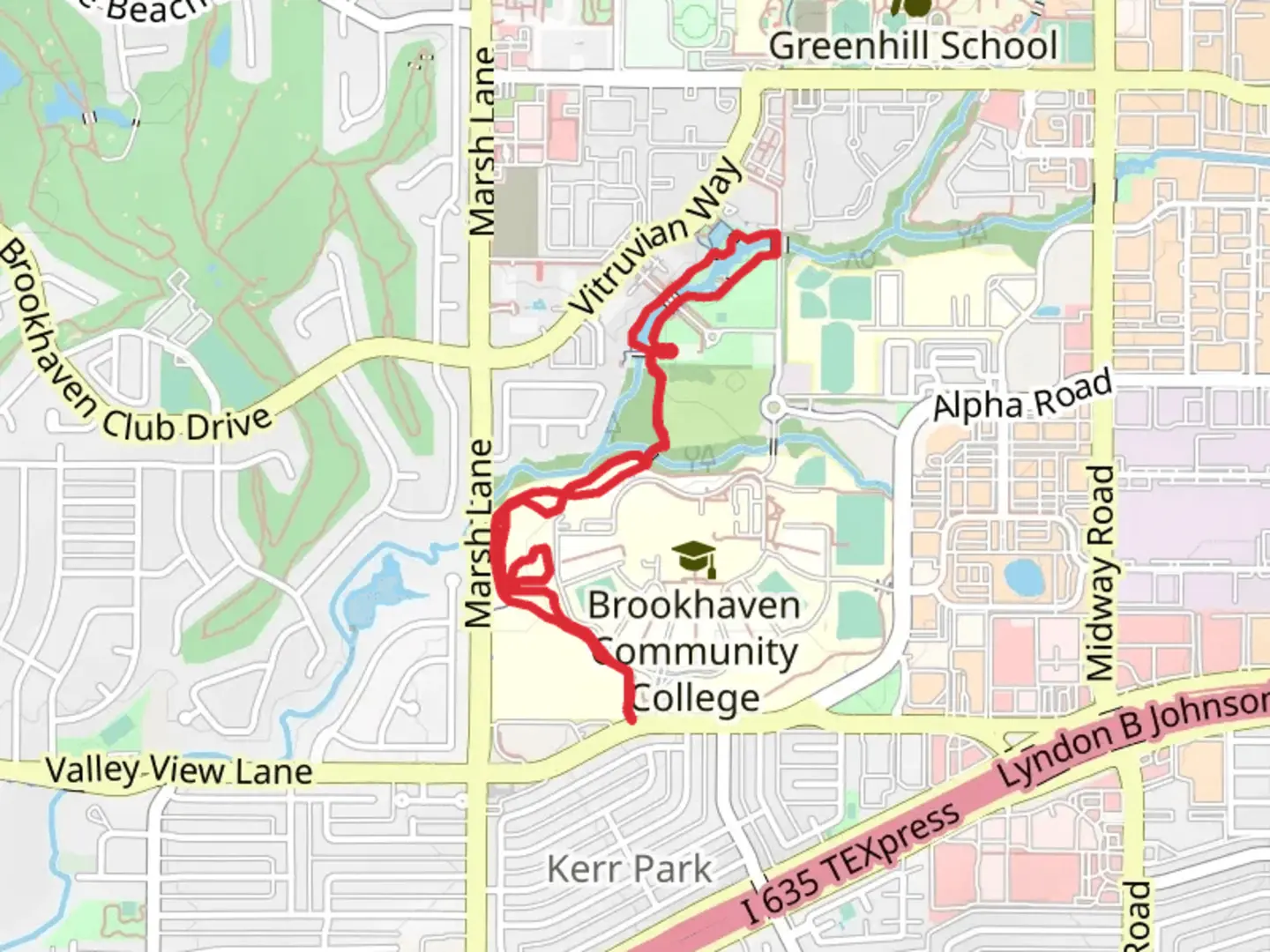 An image depicting the trail Farmer's Branch and Brookhaven Running Track and its surrounding area.