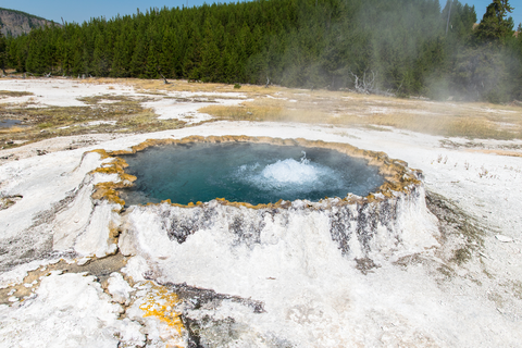 An image depicting the trail Punch Bowl - Black Sand Basin Trail and its surrounding area.