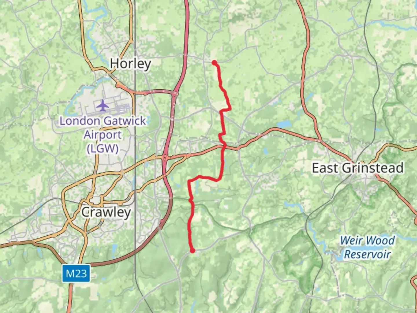 An image depicting the trail Smallfield to Poddockhurst Road via Mill Pond and its surrounding area.