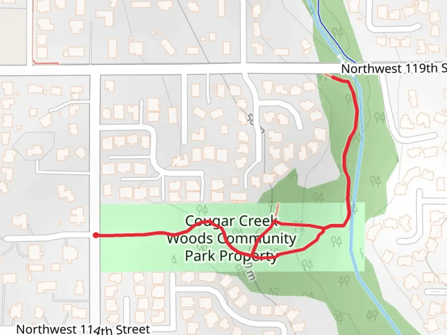 An image depicting the trail Cougar Creek Woods Community Park Property Loop and its surrounding area.