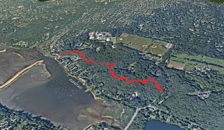 An image depicting the trail Cold Spring Harbor State Park and its surrounding area.