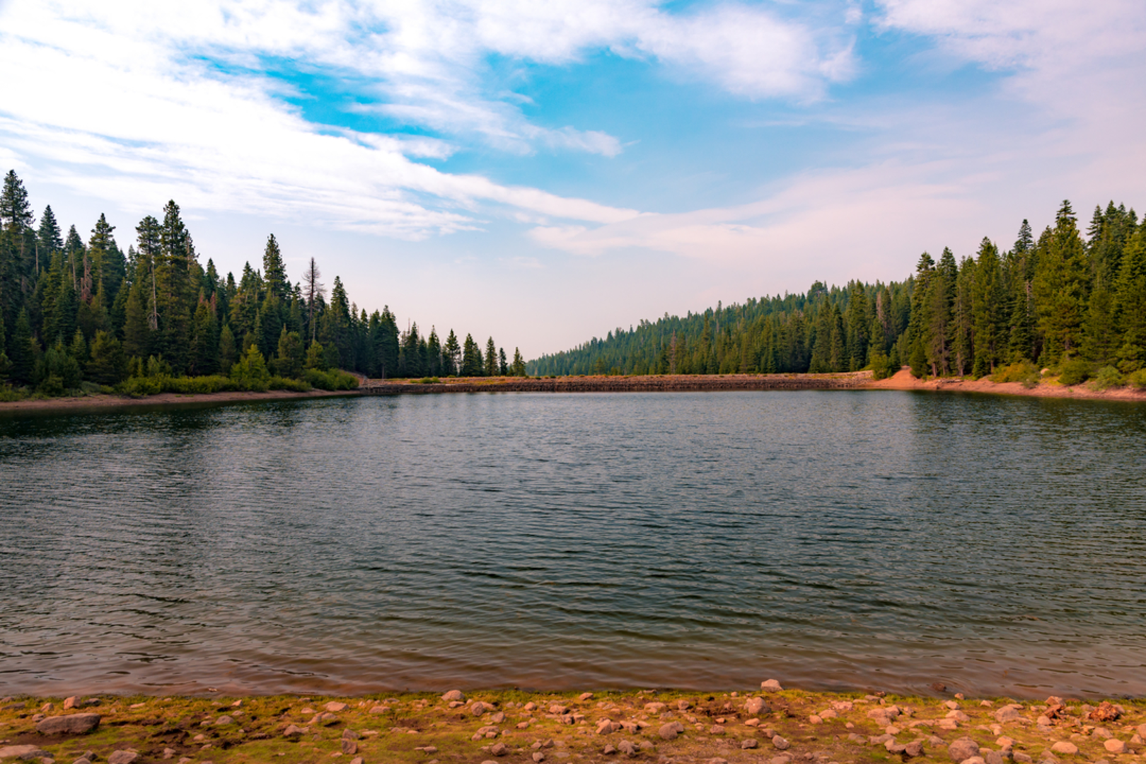 An image depicting the trail Crooked Lake and Grouse Ridge Loop Trail and its surrounding area.