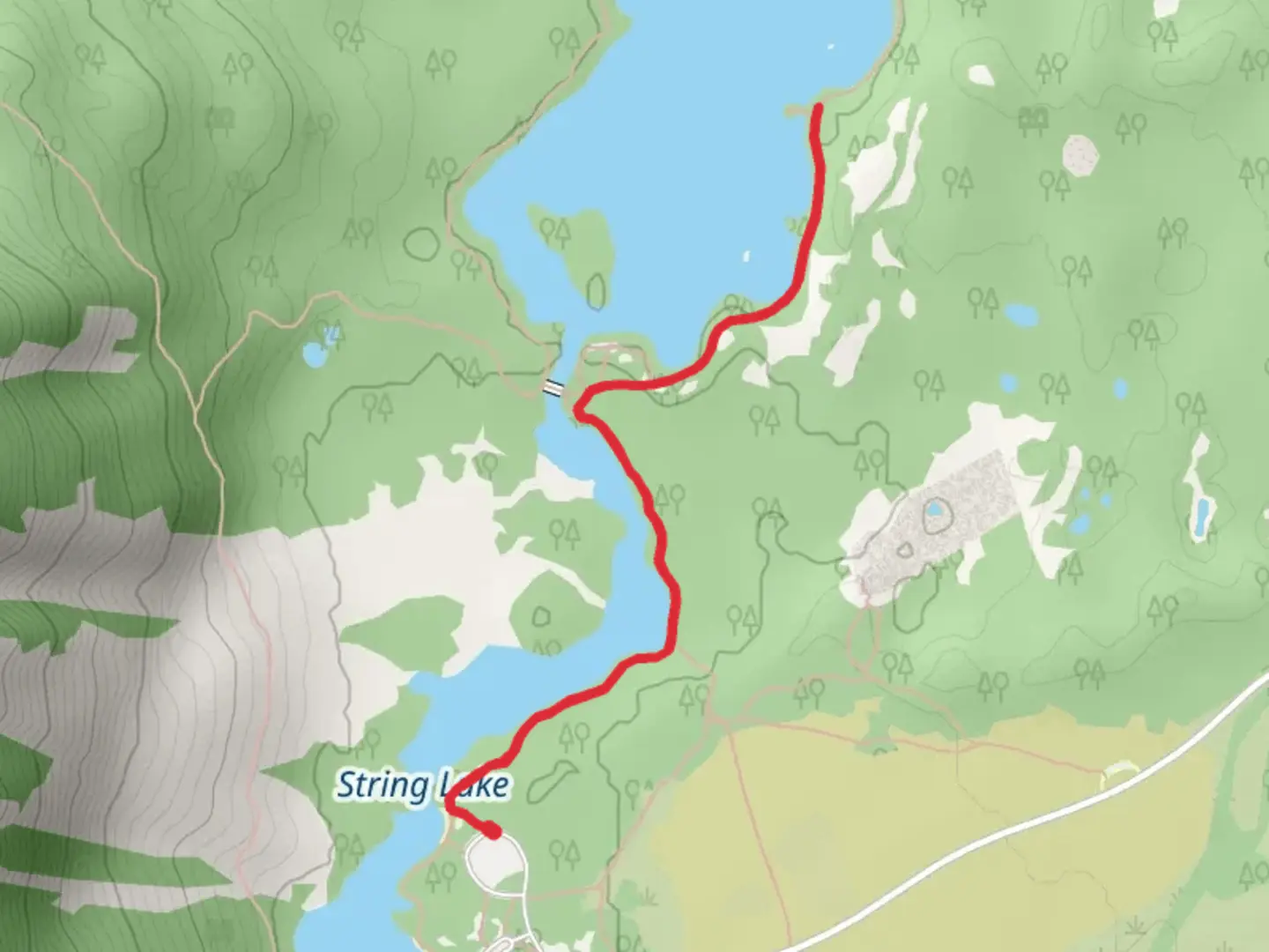 An image depicting the trail Leigh Lake via Teton Crest Trail and its surrounding area.