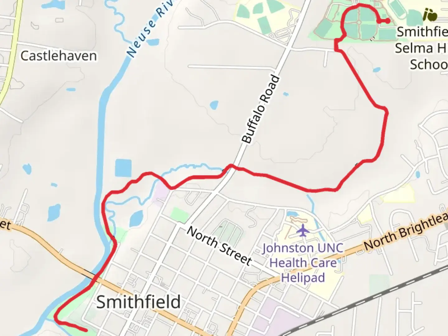An image depicting the trail Buffalo Creek Greenway and its surrounding area.