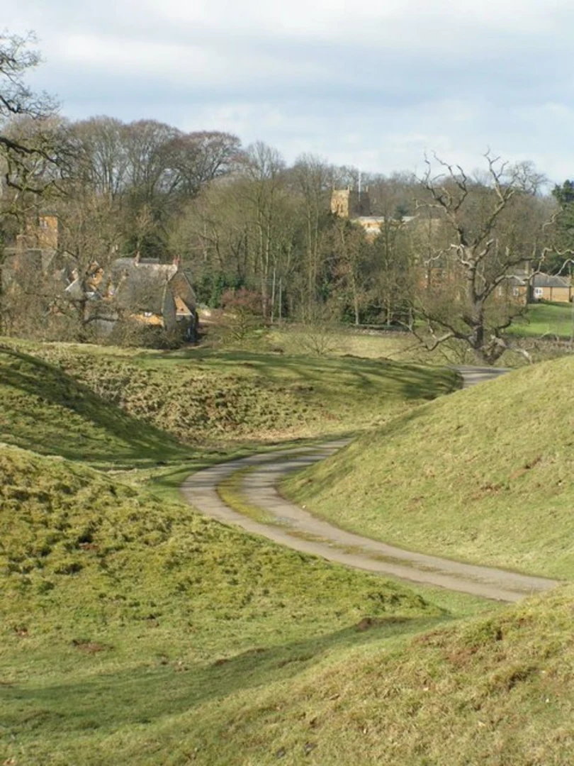 An image depicting the trail Harlestone Firs Circular Walk and its surrounding area.