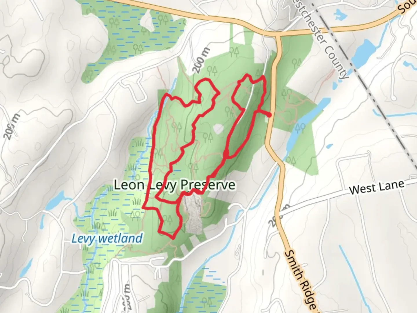An image depicting the trail Leon Levy Preserve Loop - Smith Ridge Road and its surrounding area.