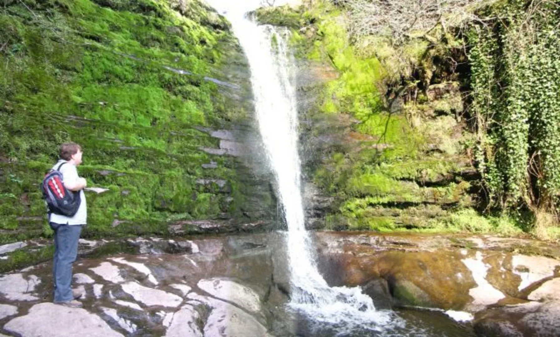 An image depicting the trail Blaen y Glyn Waterfalls Walk and its surrounding area.