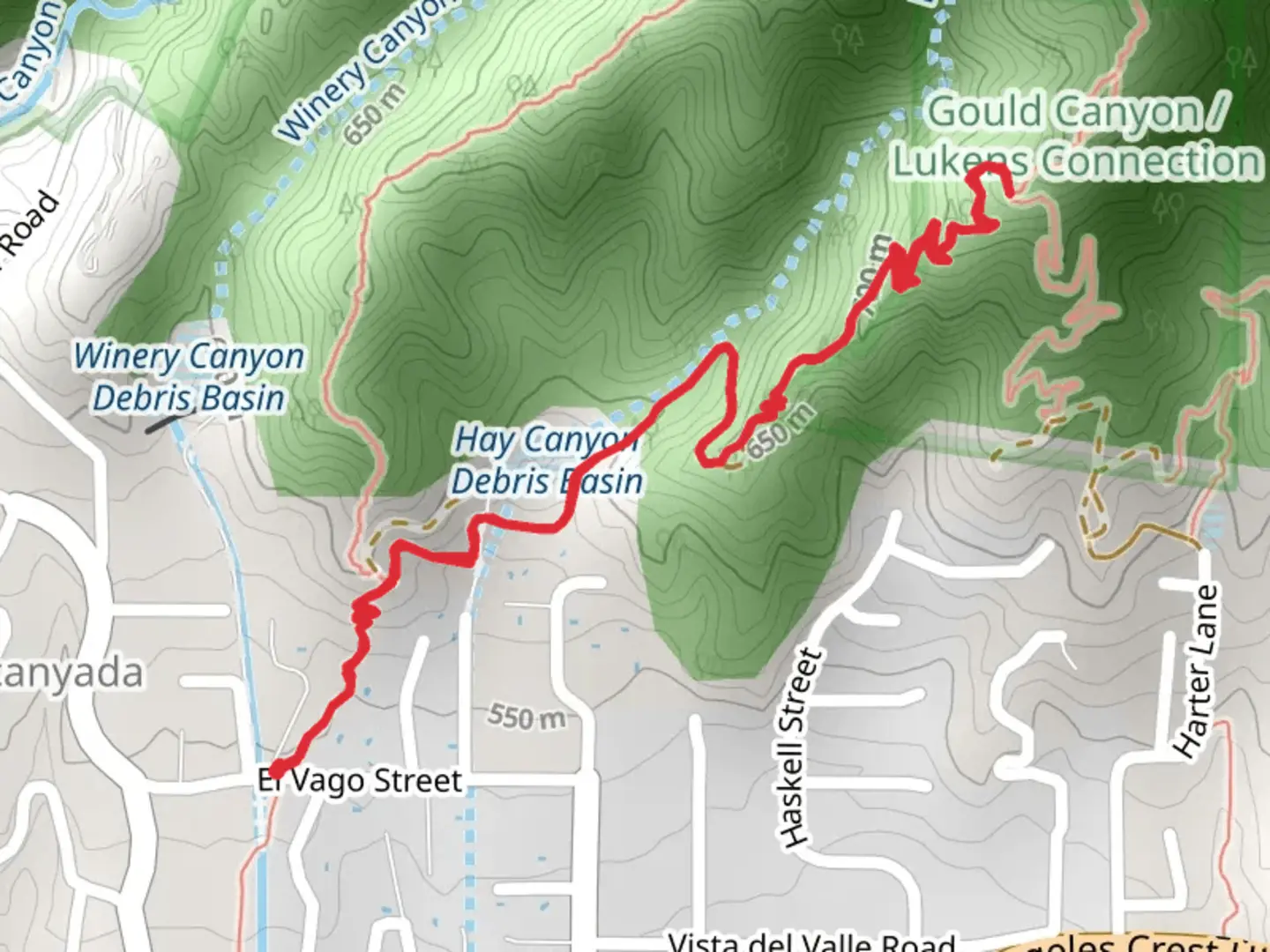 An image depicting the trail Hay Canyon Debris Basin via La Canada Open Space Trail and its surrounding area.