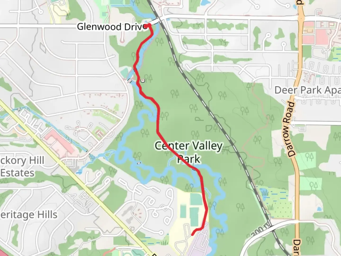 An image depicting the trail Tinkers Creek - Center Valley Park and its surrounding area.