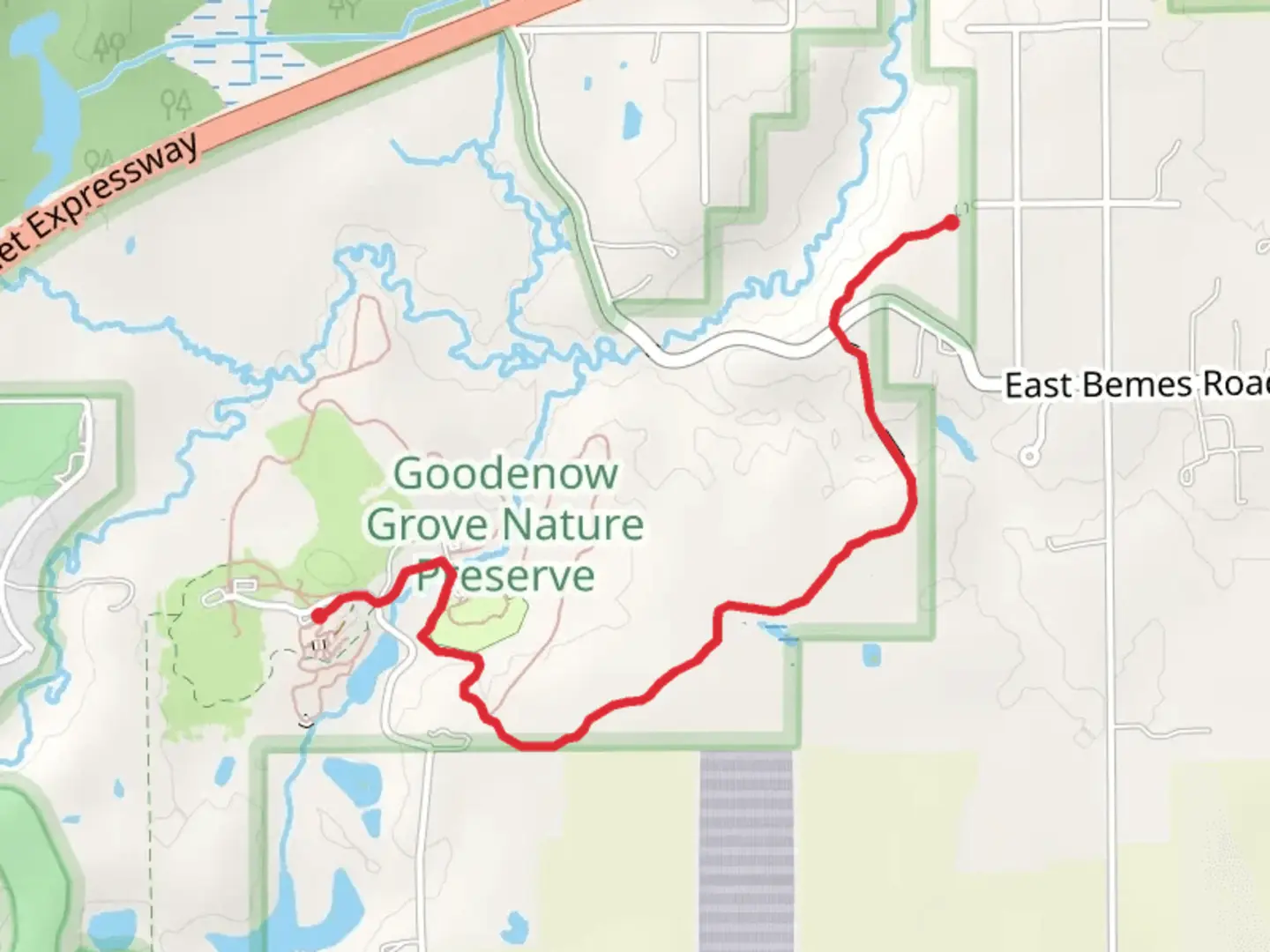 An image depicting the trail Plum Creek Greenway Trail and its surrounding area.