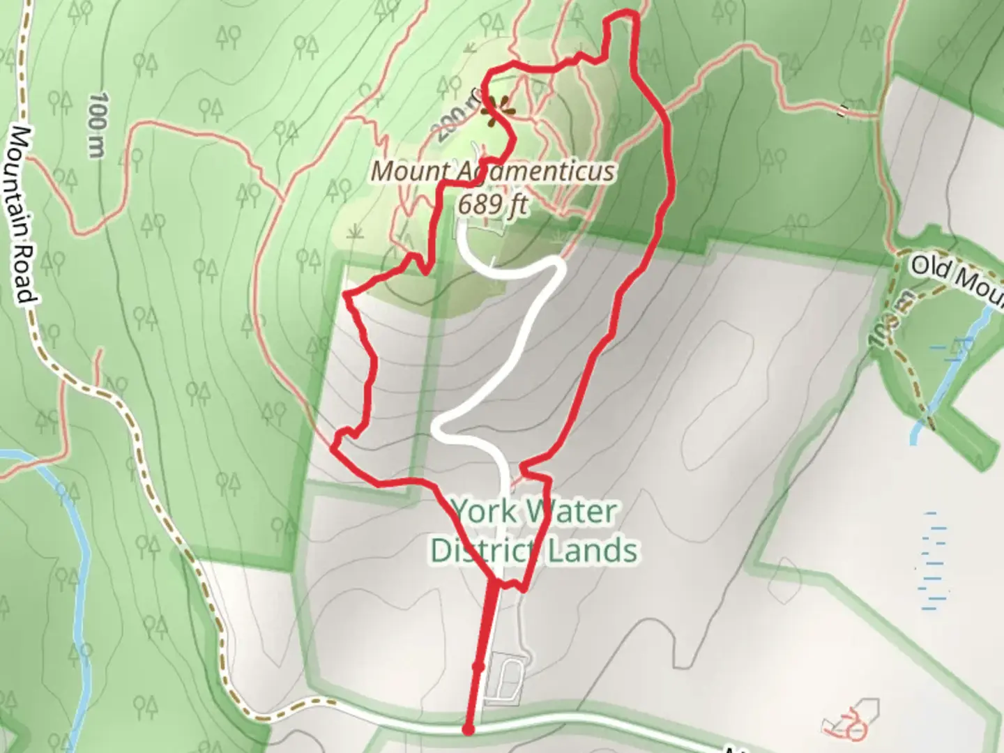 An image depicting the trail Mount Agamenticus via Ring Trail and its surrounding area.