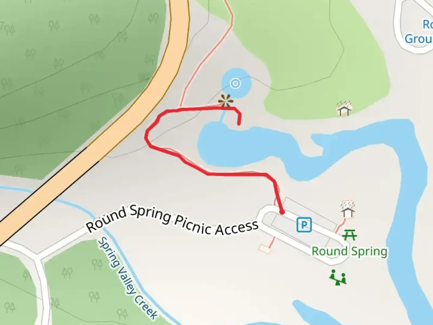 An image depicting the trail Round Spring Natural Bridge and its surrounding area.