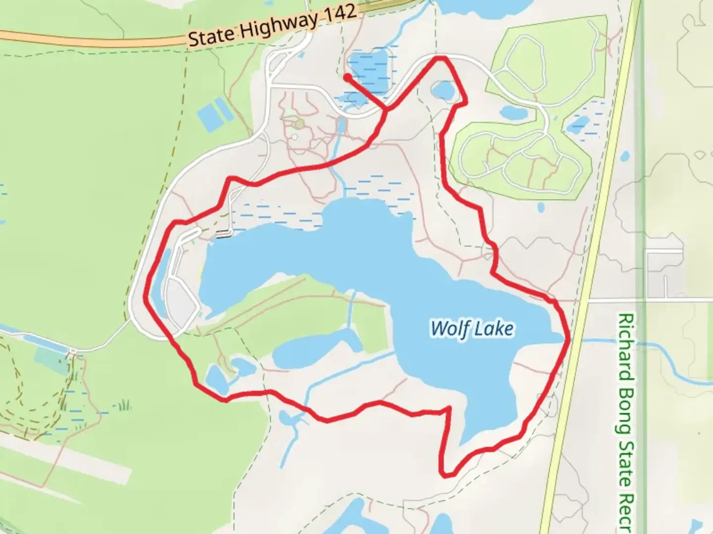 An image depicting the trail Wolf Lake - Blue Loop Trail and its surrounding area.