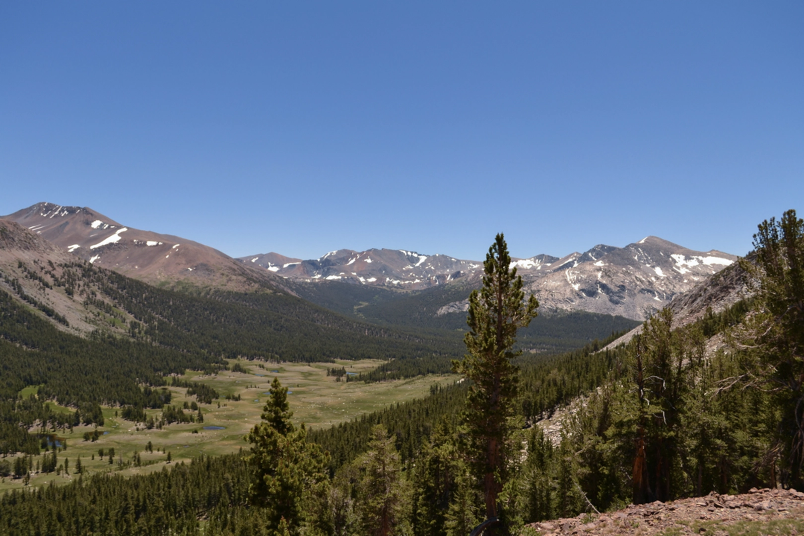 An image depicting the trail Whiskey Creek Camp via Five Lakes Trail and its surrounding area.