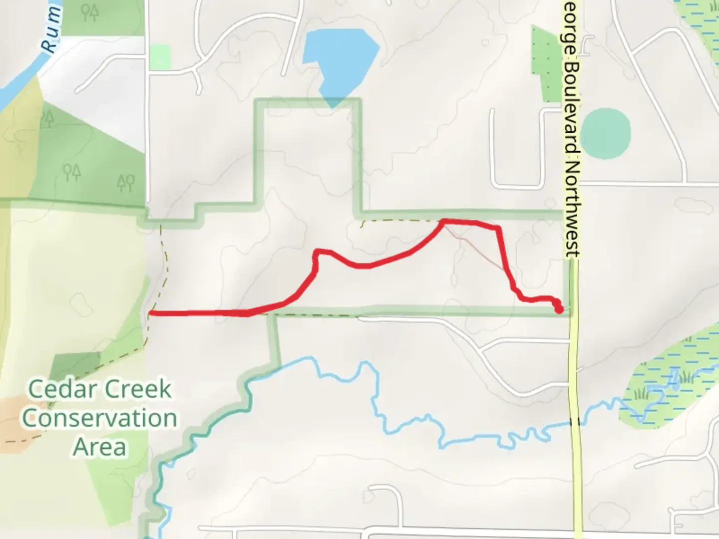 An image depicting the trail Cedar Creek Walk and its surrounding area.