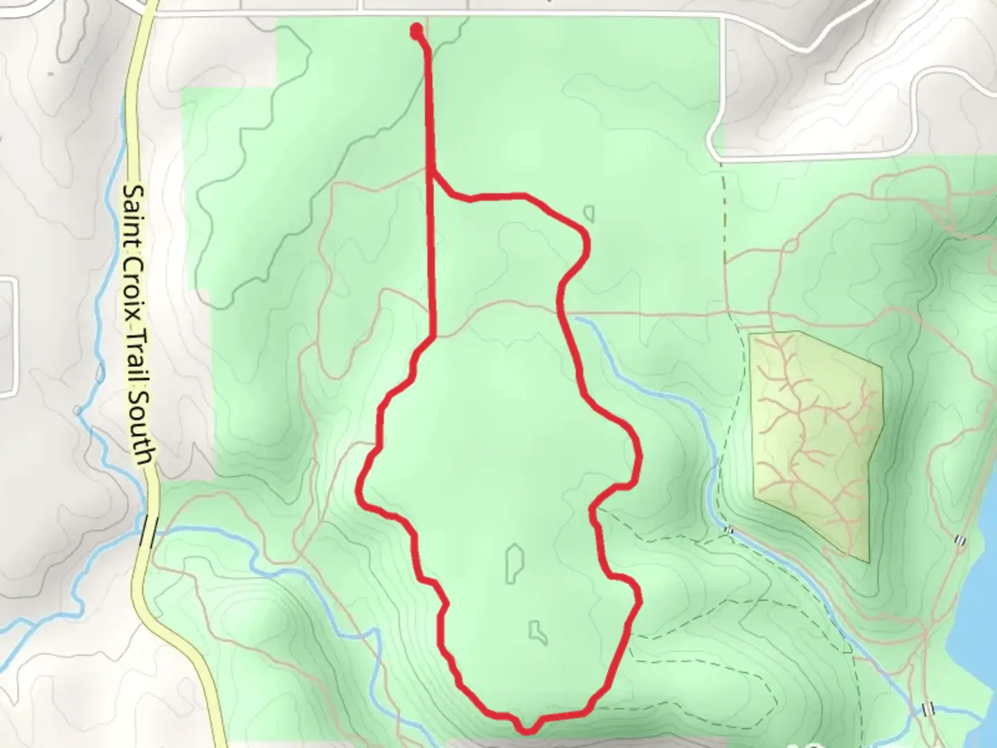 An image depicting the trail Prairie Loop in Afton State Park and its surrounding area.