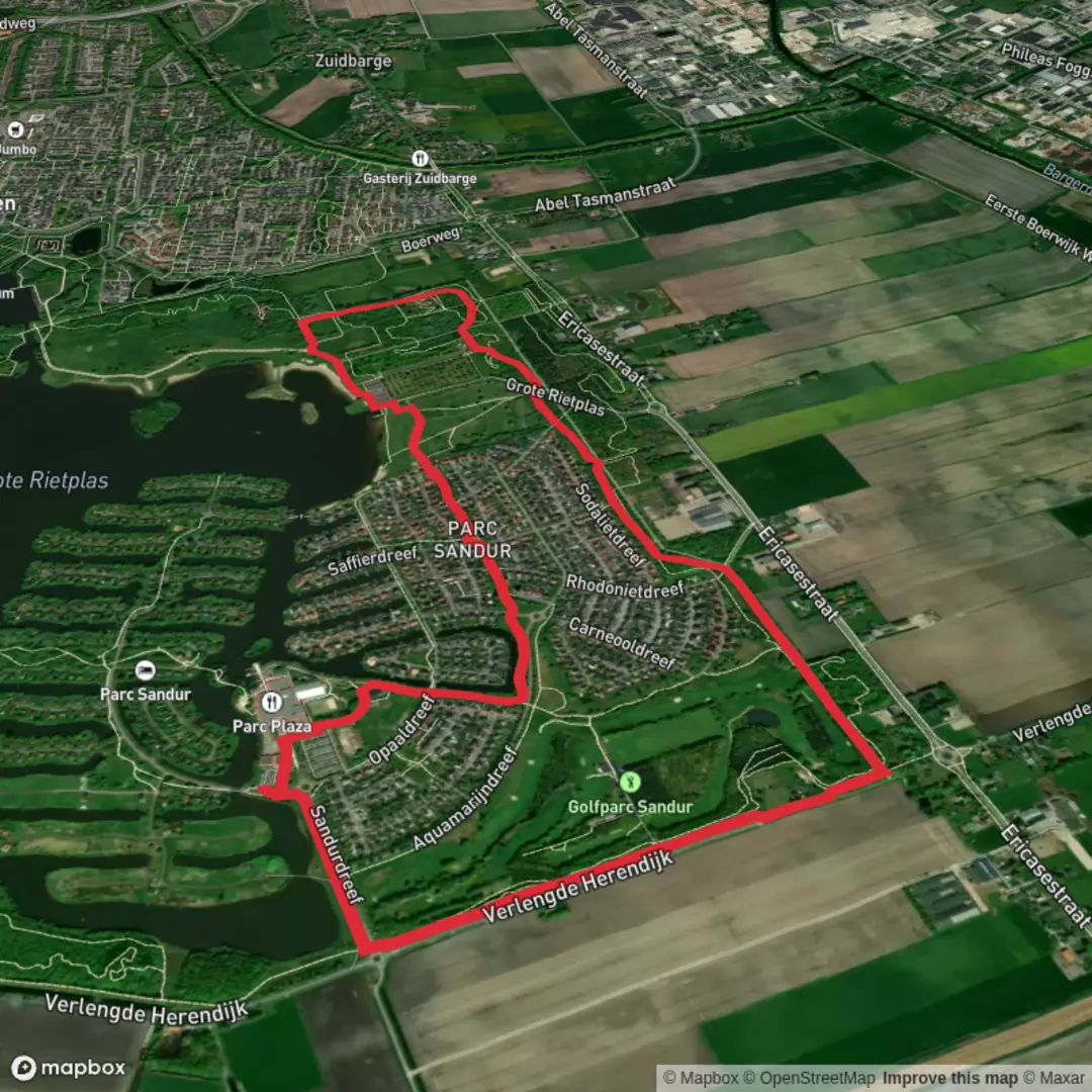 An image depicting the trail Grote Rietplas via Emmen Hardlooprondje and its surrounding area.