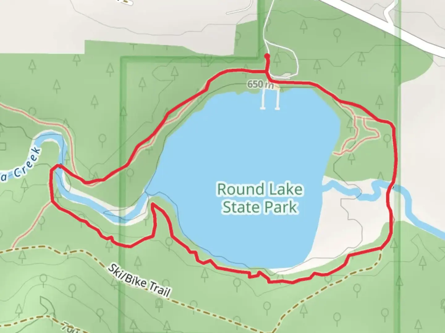An image depicting the trail Round Lake Loop and its surrounding area.
