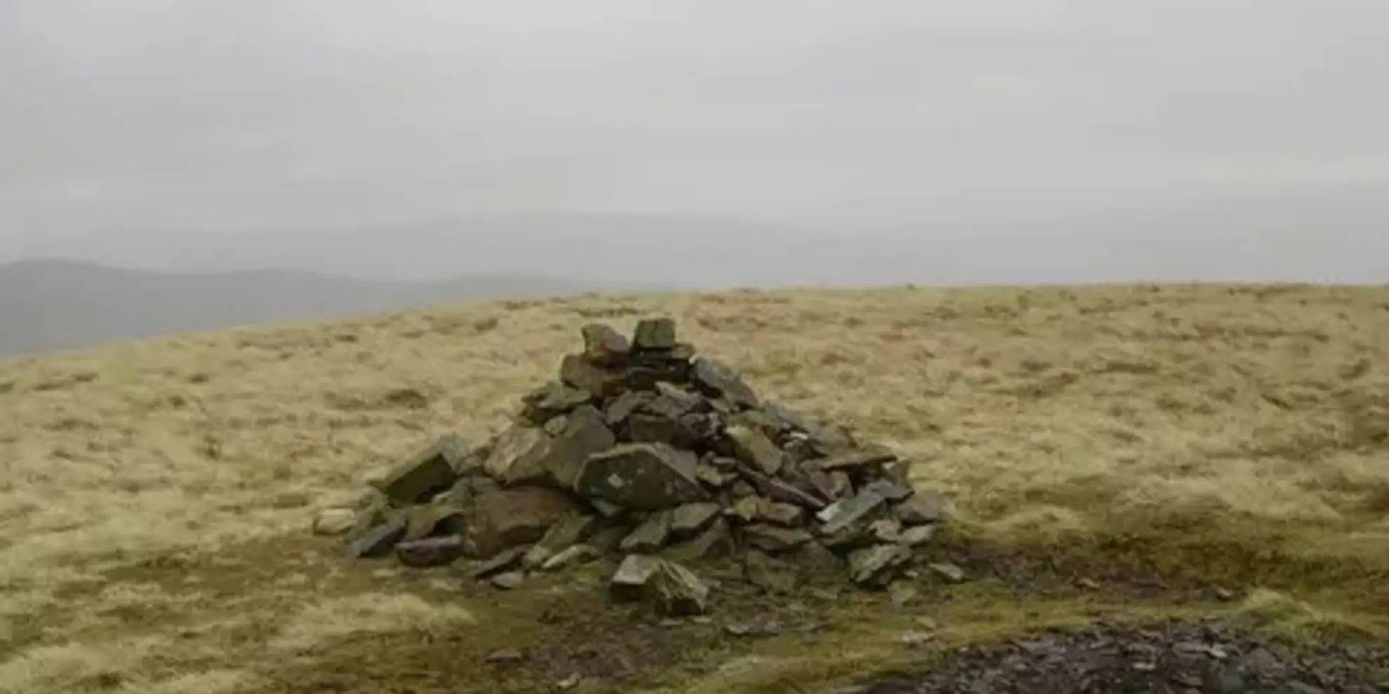 An image depicting the trail Fell Head and The Calf from Howgill near Sedbergh and its surrounding area.