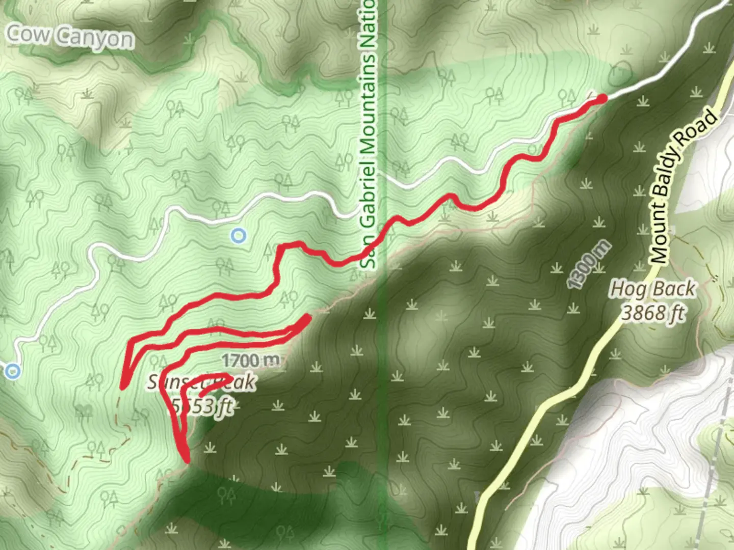 An image depicting the trail Sunset Peak and its surrounding area.