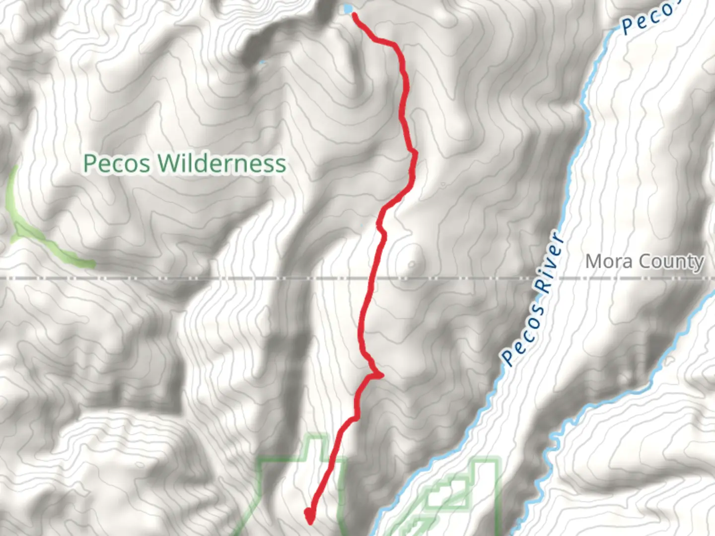 An image depicting the trail Pecos Baldy Lake via Beatty's Trail and its surrounding area.