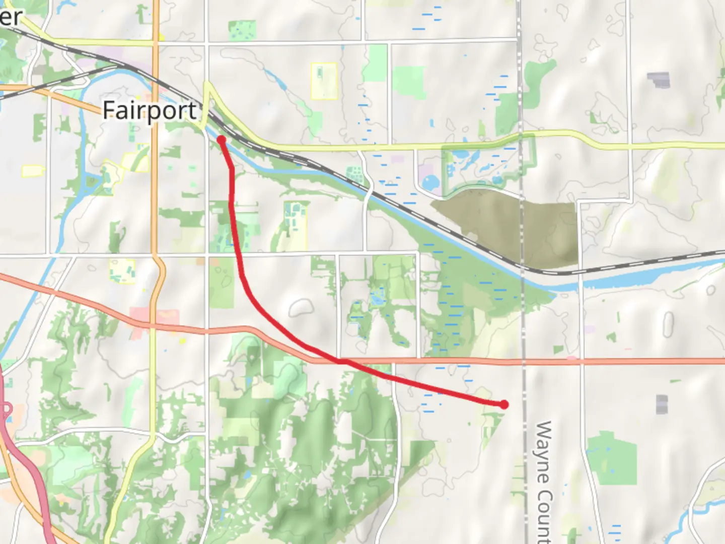 An image depicting the trail Erie Canal via Rochester, Syracuse and Eastern Trolley trail and its surrounding area.