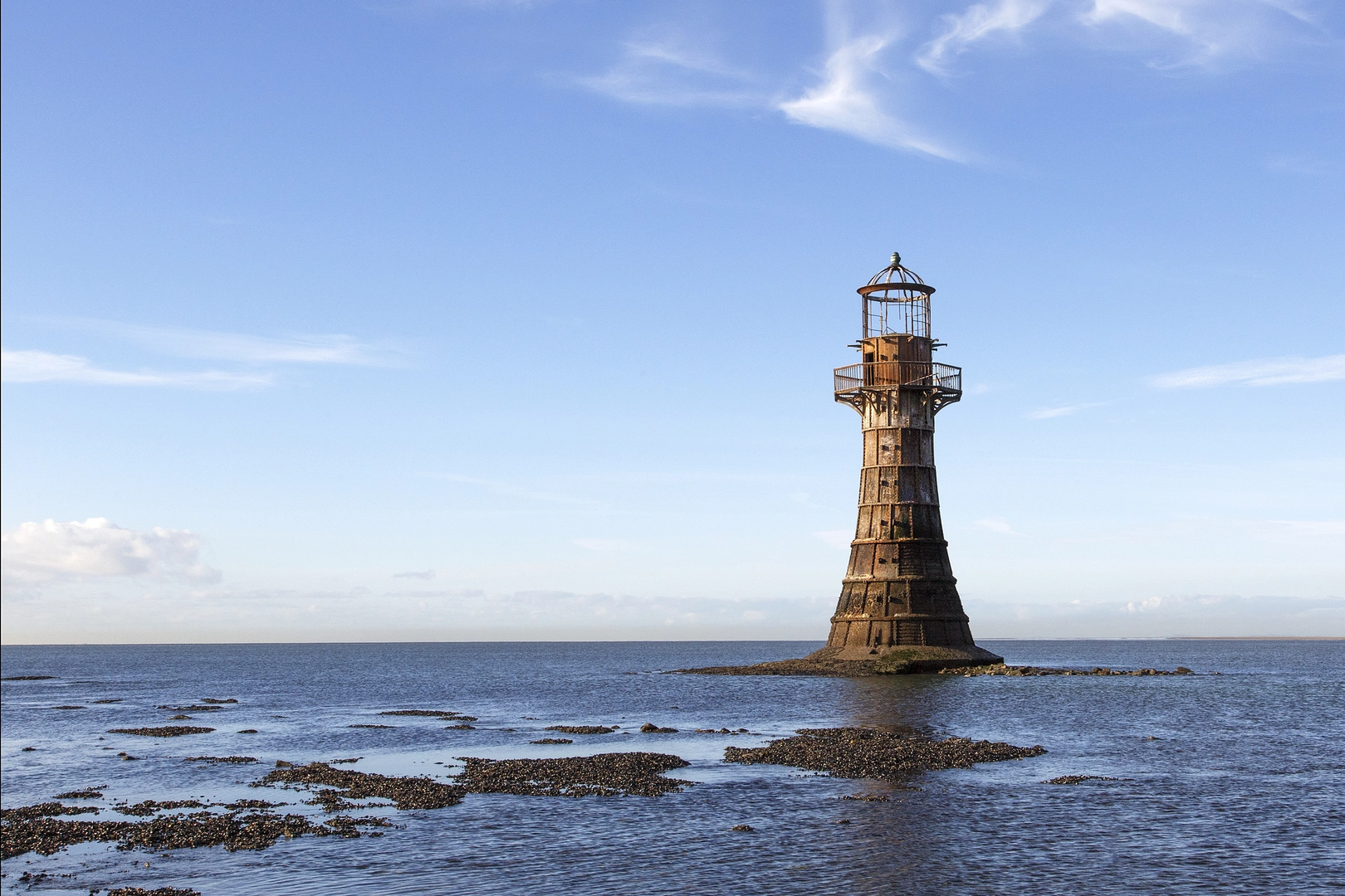 An image depicting the trail Whiteford Sands from Llanmadoc and its surrounding area.