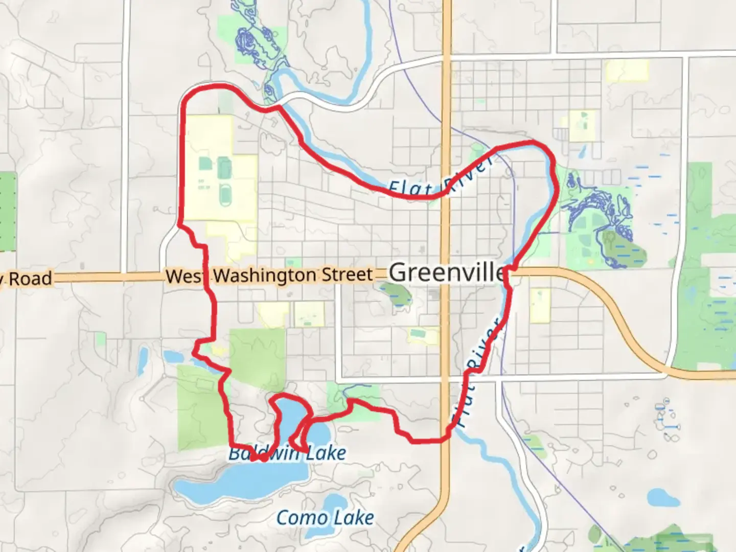 An image depicting the trail Manoka Lake, Baldwin Lake - Fred Meijer Flat River Loop Trail and its surrounding area.